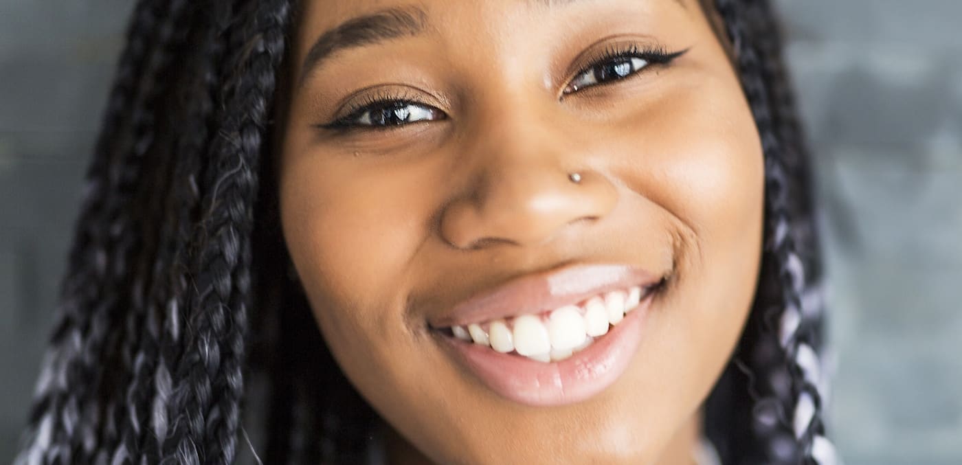 Female high school student smiling