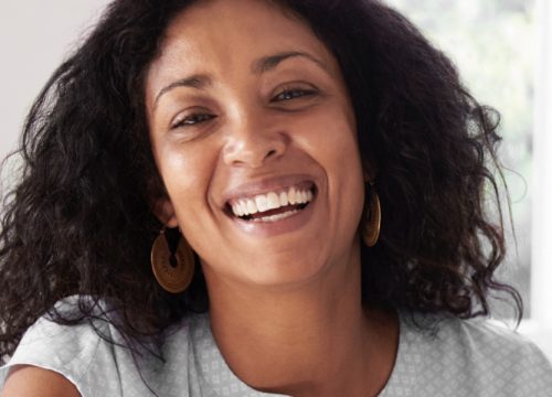 Happy woman after ICON™ skin resurfacing treatments