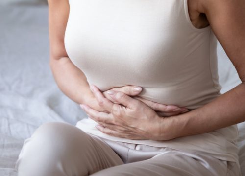 Woman experiencing pelvic pain