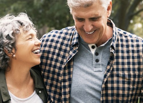 Healthy older couple outside after a pollution detox