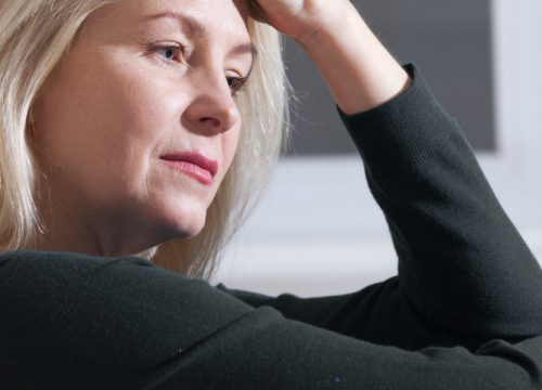 Woman suffering from uterine polyps