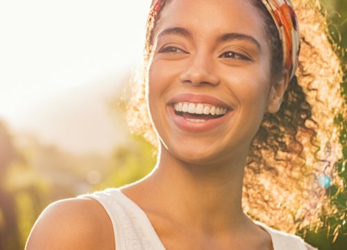 Happy, healthy woman after Well Woman Exams