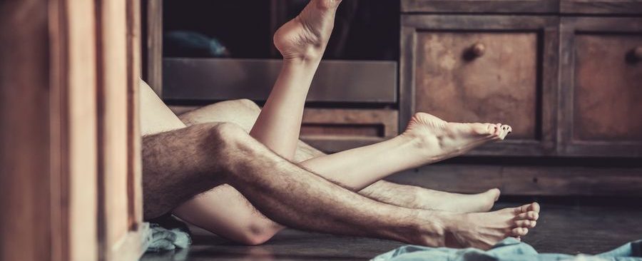 Couple having sex on the floor